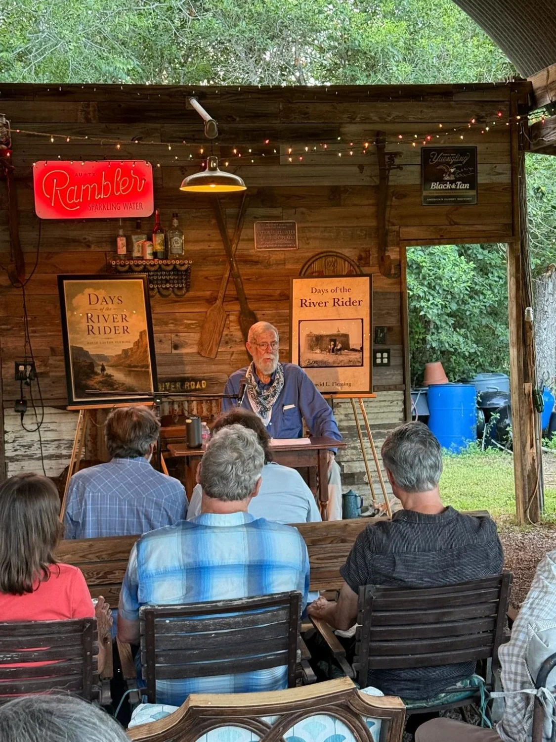 David Layton Fleming speaking to an audience at a book event